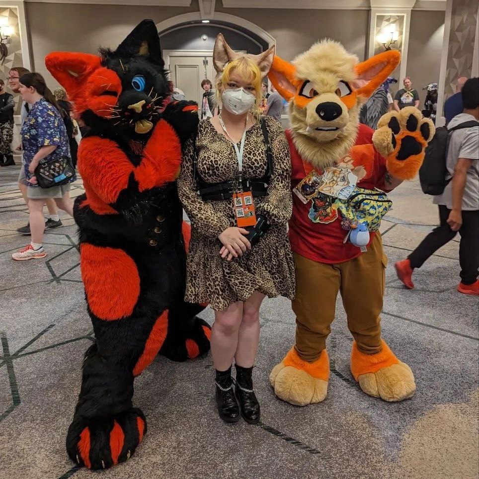 posing with fursuits
